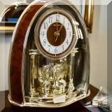 D22. Rhythm Swarovski clock. 